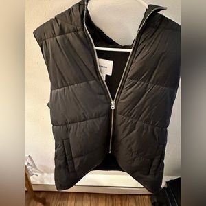 Quilted Puffer Vest for Women with a hoodie on the jacket